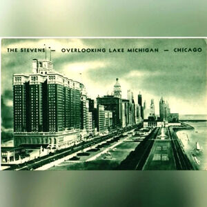 THE STEVENS - OVER LOOKING LAKE MICHIGAN- CHICAGO- Vintage Postcard